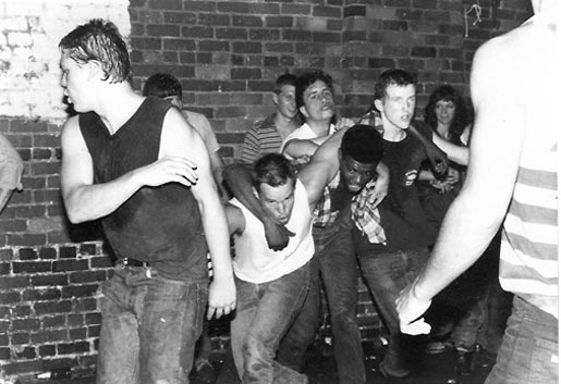 Jon Stewart in the pit at an early '80s DK show