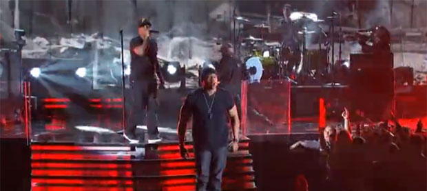 Chuck D and LL Cool J perform with Tom Morello and Travis Barker at 2012 Grammy Awards